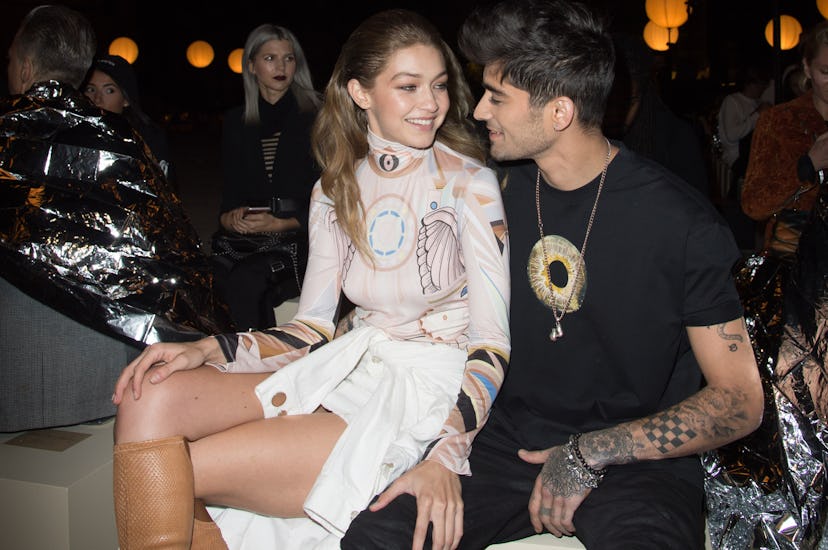 Gigi Hadid and Zayn Malik beaming.