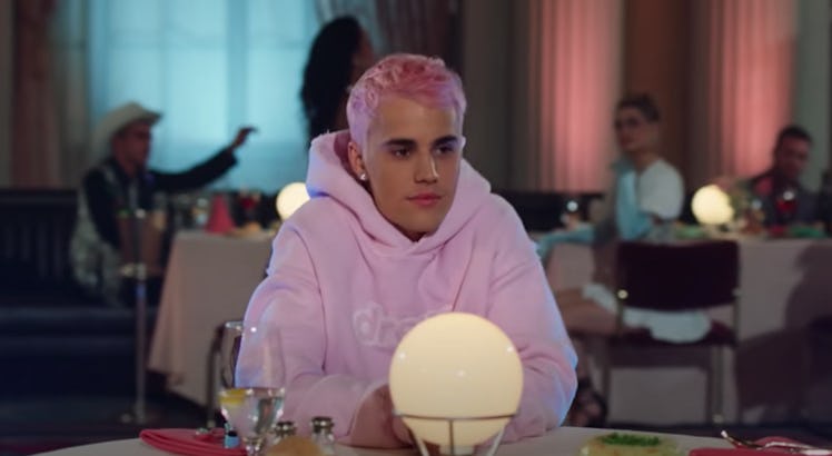 Justin Bieber with a pink hairstyle