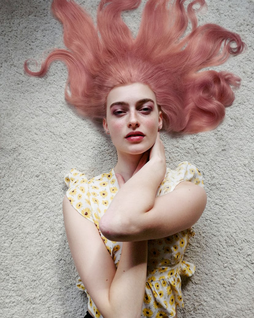 Berit Heitmann in a yellow floral top with a fantasy hairstyle by Evanie Frausto