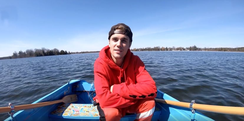 Justin Bieber in a rowboat.