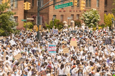 Huge crowd in white shirts at a street during Brooklyn Liberation Action for Black Trans Lives