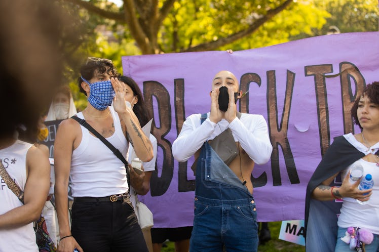 Fan Tirado, Elie Cruz, and Melania Brown standing next to each other during the Brooklyn Liberation