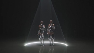 Chloe and Halle Bailey in Silver tops, skirts and boots performing at the MTV VMAs 2020