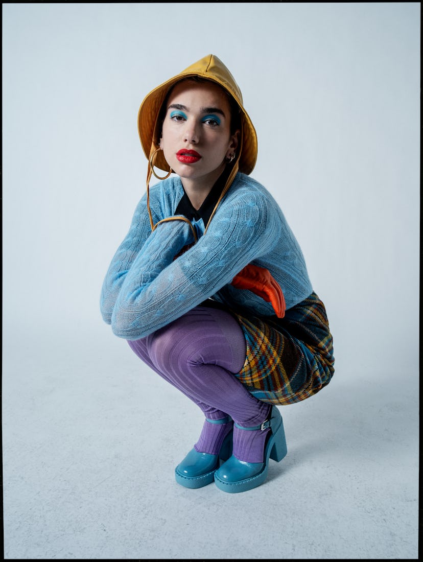 Dua Lipa in a blue sweater