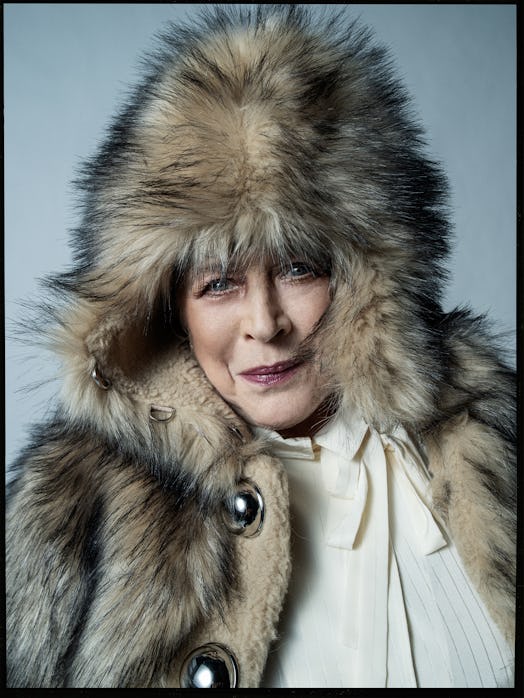 Marianne Faithfull wearing a fur coat