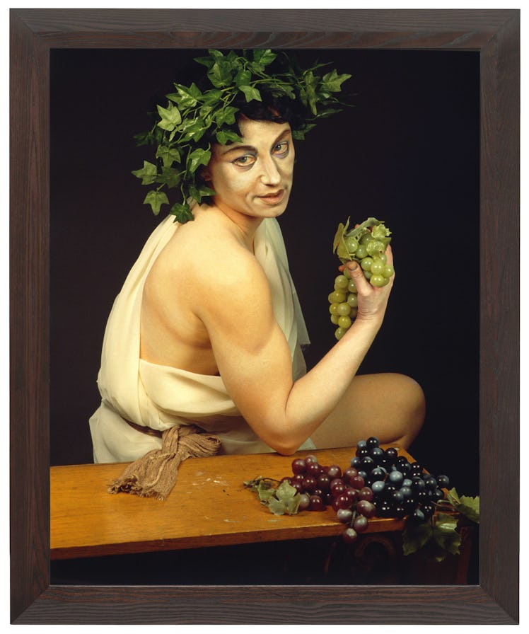 Cindy Sherman artwork of a woman posing while holding grapes