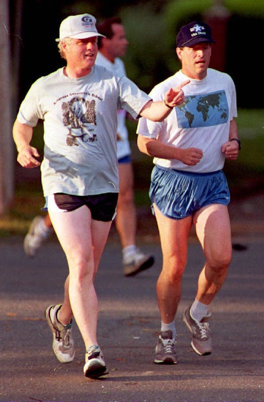 Bill Clinton and Al Gore jog.