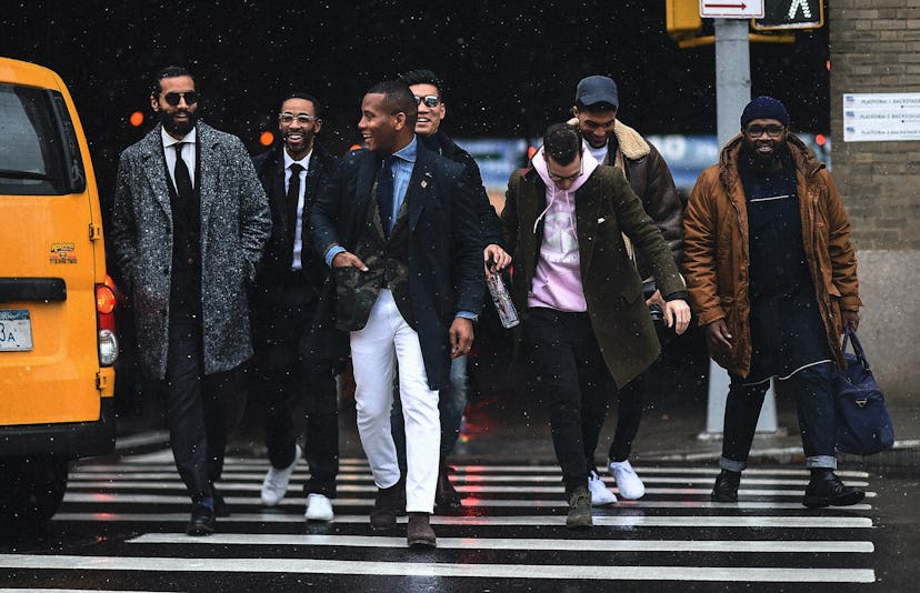Fashion Week people crossing the street