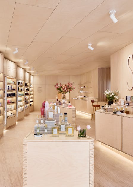 The inside of a Shen Beauty store with beige interior