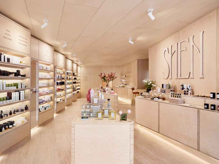 The inside of a Shen Beauty store with beige interior