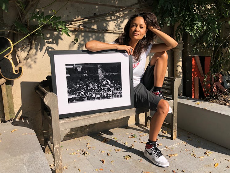 Westworld’s Thandie Newton posing for a photo next to a "The Last Dance" photo