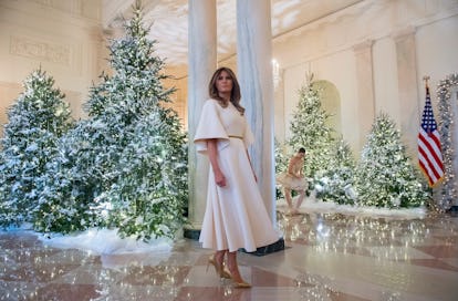 Melania Trump in the White House with Christmas trees