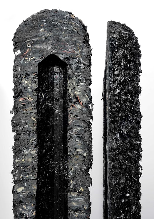 Two parts of a big black sculpture