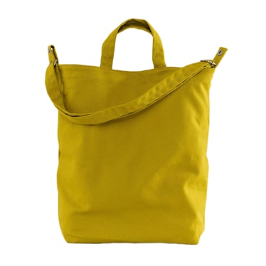 A yellow Baggu canvas bag as one of the most stylish tote bags under $100