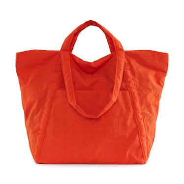 An orange Baggu cloud bag as one of the most stylish tote bags under $100