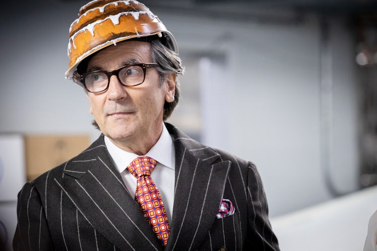 Griffin Dunne wearing a formal suit in a Search Party