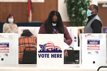 A person voting