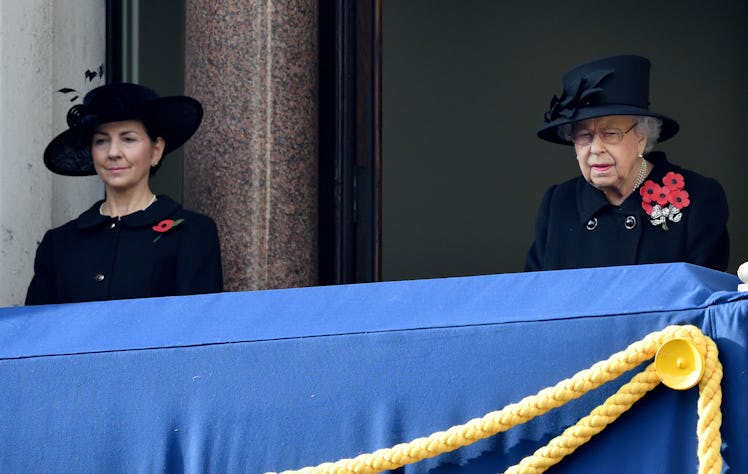 Susan Rhodes and Queen Elizabeth II on a balcony