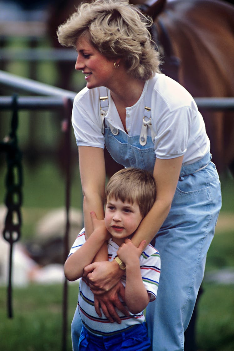 Princess Diana holding Prince William