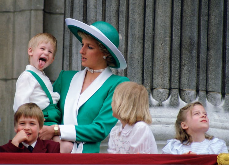 Prince Harry and Princess Diana on a balcony