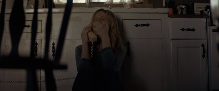 he Dark and the Wicked Star Marin Ireland in a screenshot from the movie sitting on the floor and cr...