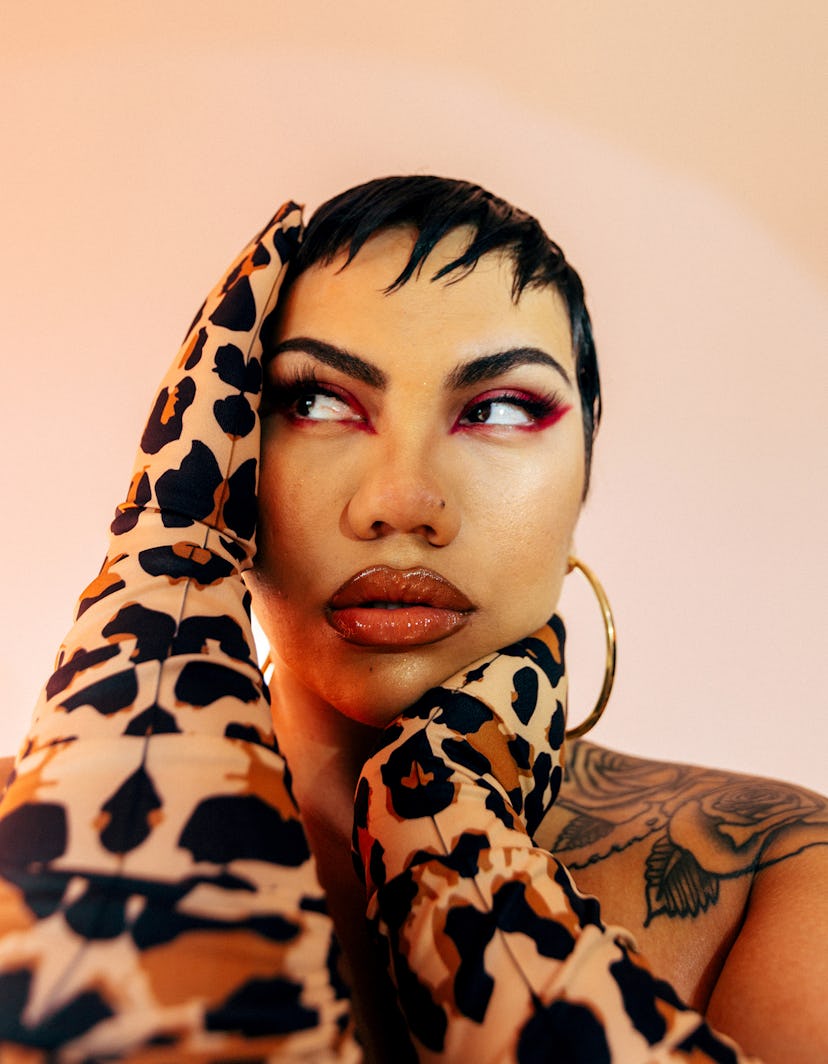Parris Goebel posing with leopard printed gloves