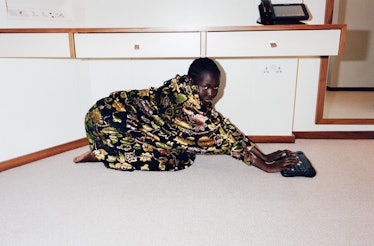 A model, Adut Akech posing for a photo