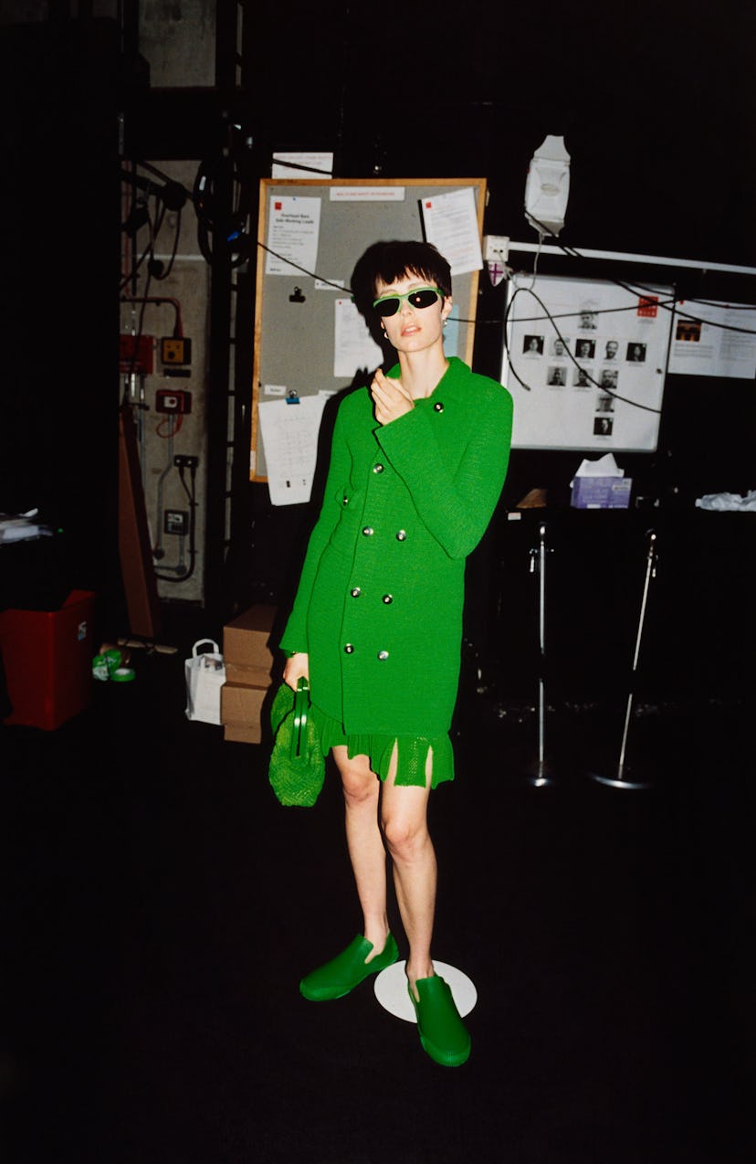 A model wearing an all-green outfit at Bottega Veneta’s Spring 2021 presentation