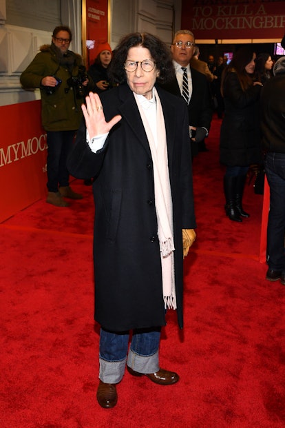 Fran Lebowitz holding up her hand