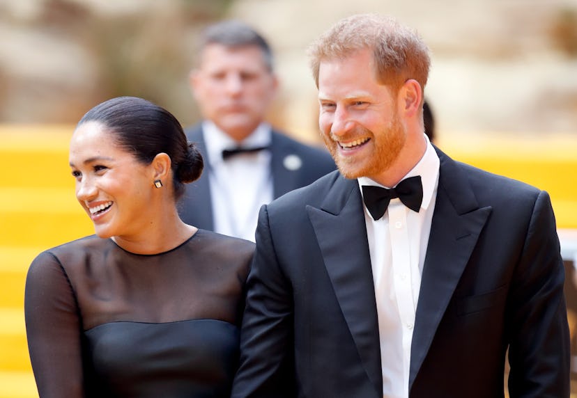 Meghan Markle and Prince Harry in fancy attire.