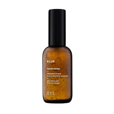 The Klur daily moisture cleanser in a brown translucent bottle with a black cap 