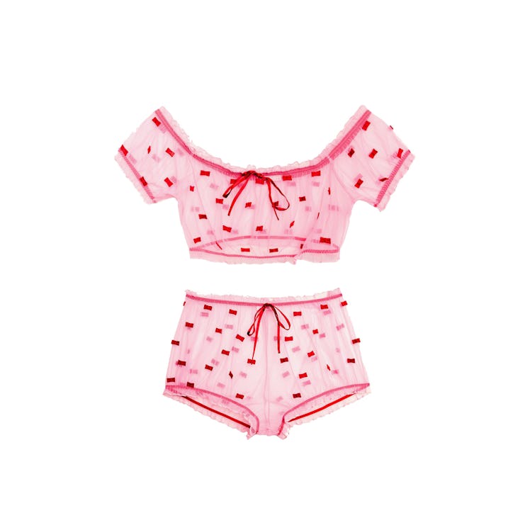 A sheer off the shoulder Fleur du Mal set in pink and red