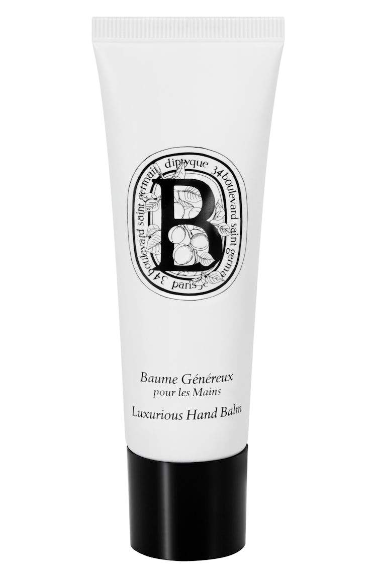 Diptyque Luxurious Hand Balm in a white tube with a black cap 