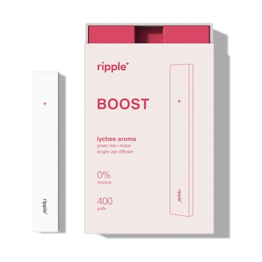 A Ripple Botanical Vaporizer next to the box it comes in 