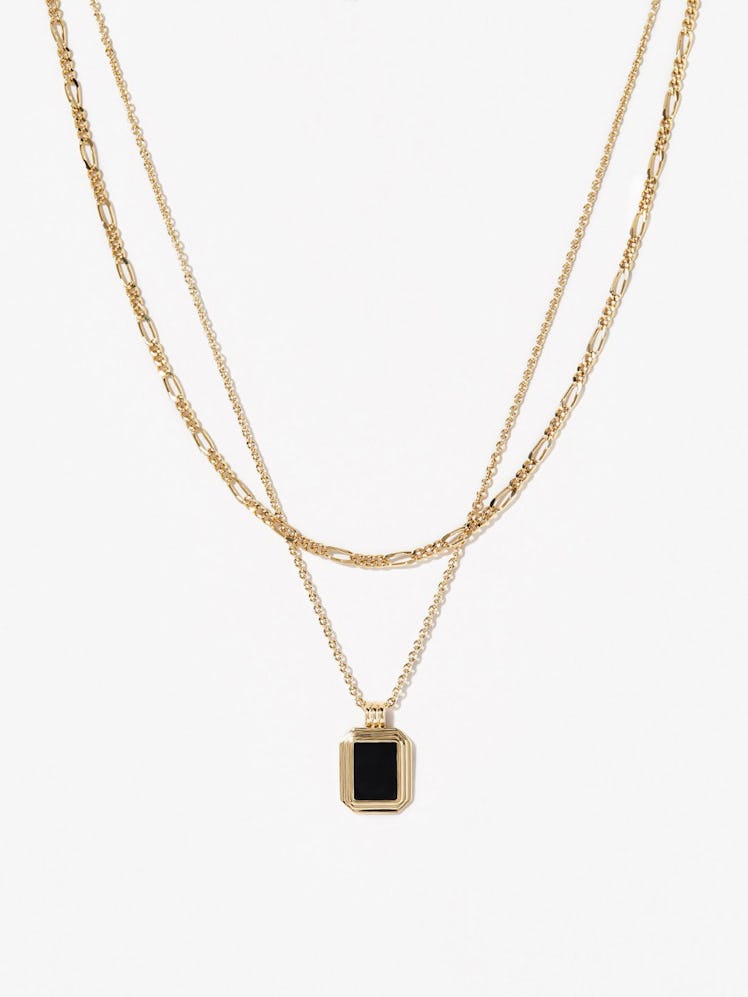 An Ana Luisa Necklace with a black pendant 