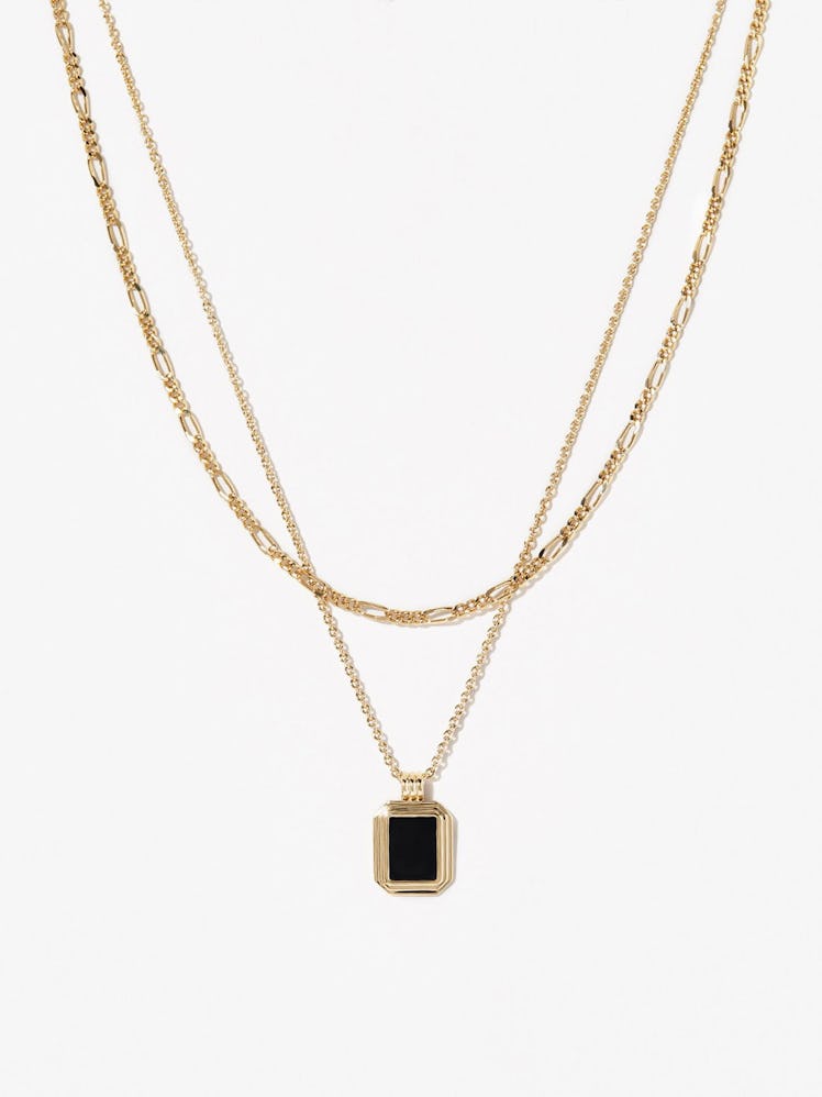 An Ana Luisa Necklace with a black pendant 