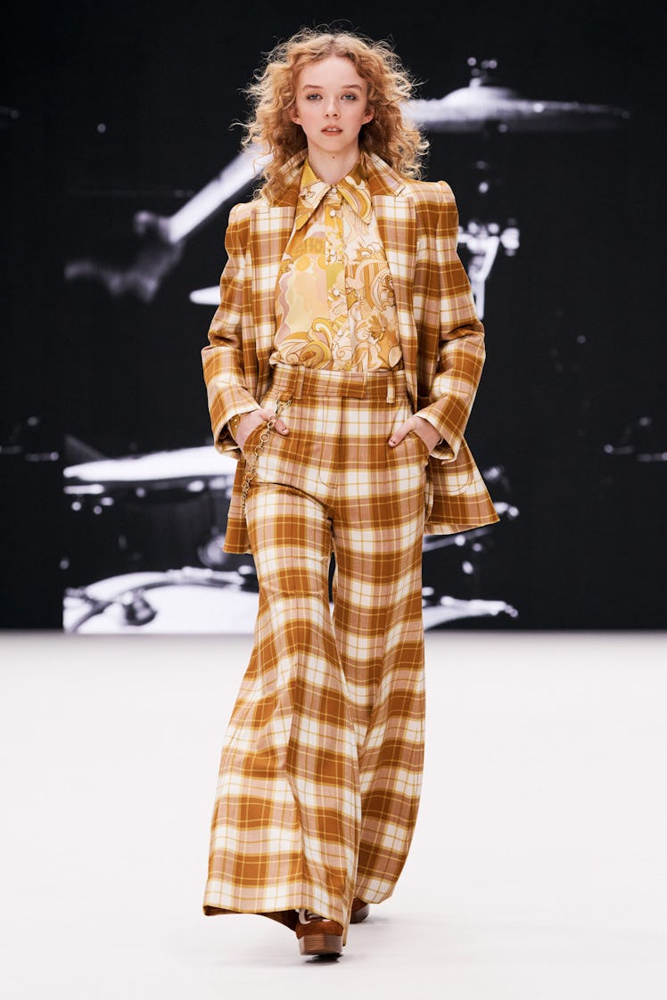 A model at New York Fashion Week in a checkered suit with wide-leg pants by Zimmermann