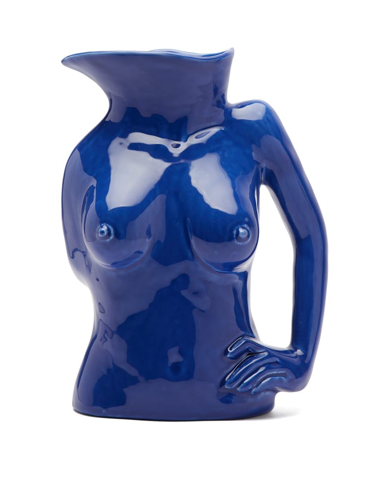 An Anissa Kermiche vase in blue shaped like the torso of a naked woman 