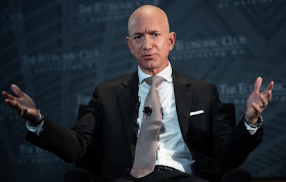 Jeff Bezos and his outstretched hands.