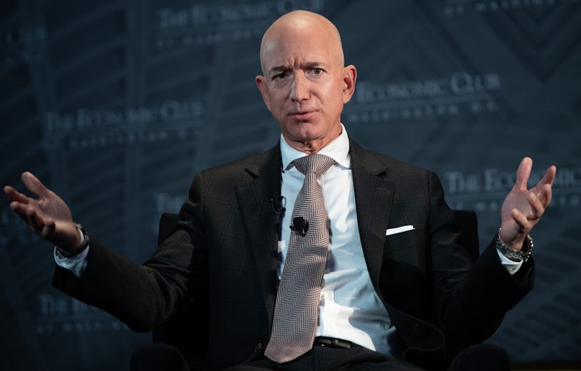 Jeff Bezos and his outstretched hands.