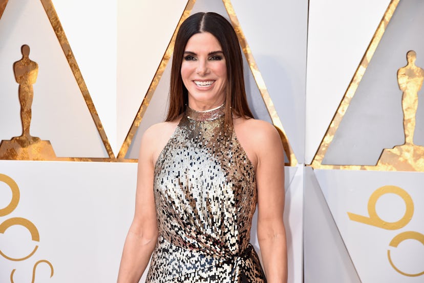 Sandra Bullock in metallic dress.