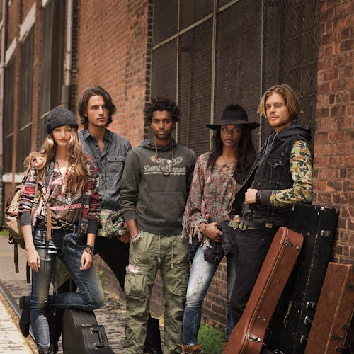 Three men and two women with guitars in outfits from the Denim & Supply look book editorial