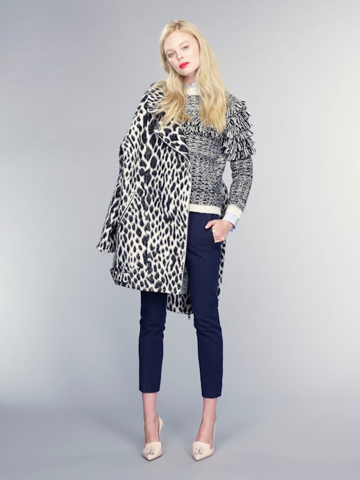 A model posing with Banana Republic's spotted coat