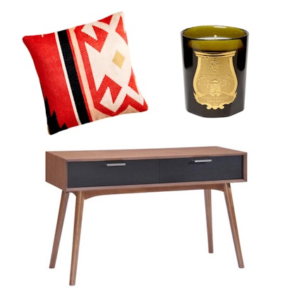 Heritage half stripe pillow, eucalyptus scented candle, and a Liberty City console table