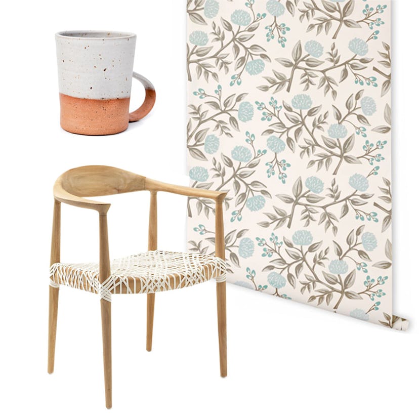 Peonies wallpaper piece, a dimpled mug, and a Francesca armchair
