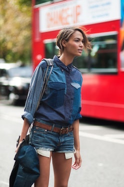 A woman wearing a denim trend outfit