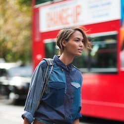 A woman wearing a denim trend outfit