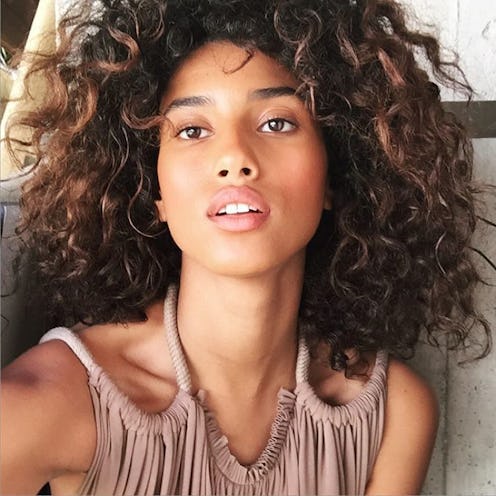 Imaan Hammam with her natural, big, curly hair