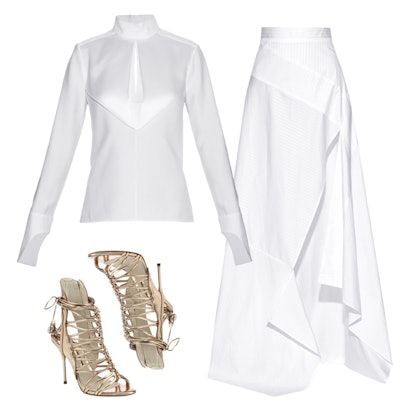 Leather strappy sandals, a white split striped maxi skirt, and a white silk-satin blouse on a white ...
