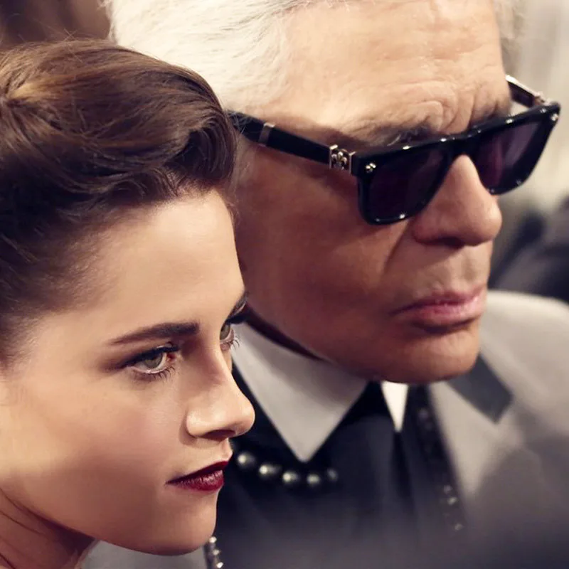 Watch Kristen Stewart & Lily-Rose Depp Talk About The Magic Of Karl Lagerfeld
